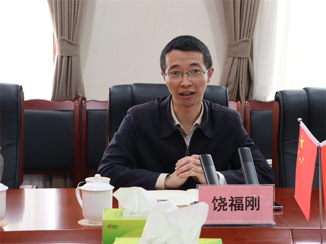 鄧華會見宜賓市供銷社黨委書記、理事會主任饒福剛一行